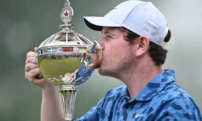 Robert kissing trophy