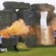 Stonehenge covered in powder paint by Just Stop Oil protesters