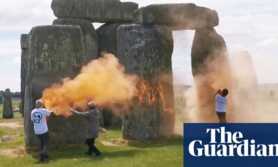 Stonehenge sprayed with orange powder paint by Just Stop Oil activists | UK news