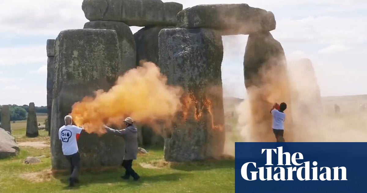 Stonehenge sprayed with orange powder paint by Just Stop Oil activists | UK news