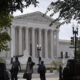 3 people standing in front of the US Supreme Court