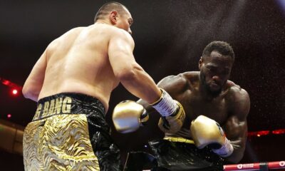 Zhilei Zhang finishes Deontay Wilder in brutal 5th-round TKO