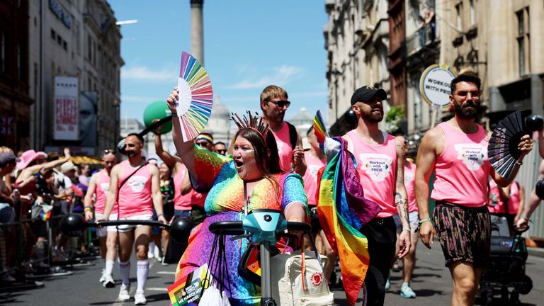 People take part in the 2024 Pride Parade on its way through Trafalgar Square.
Pic: Reuters