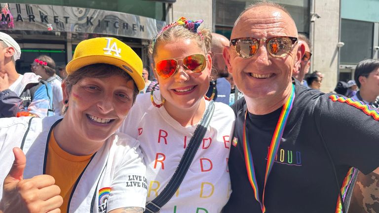 Kelly Panayi (centre) with her wife and friend