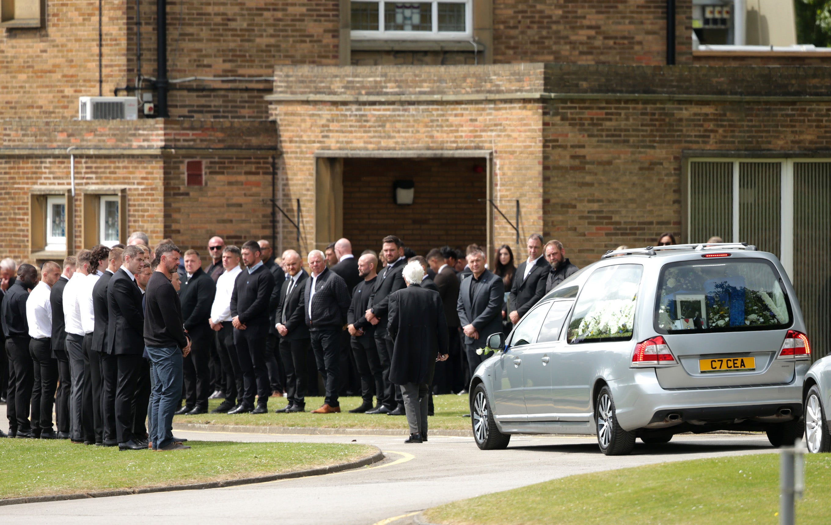 The funeral cortege arrives at Pontefract Crematorium in Wakefield