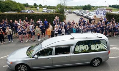 Mourners line the streets to pay final respects to Rob Burrow ahead of funeral