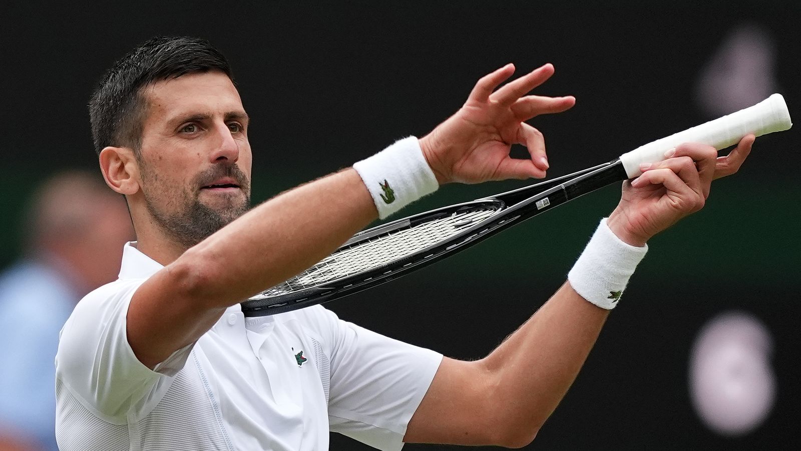 Novak Djokovic celebrates victory over Lorenzo Musetti (not pictured) on day twelve of the 2024 Wimbledon Championships at the All England Lawn Tennis and Croquet Club, London. Picture date: Friday July 12, 2024.