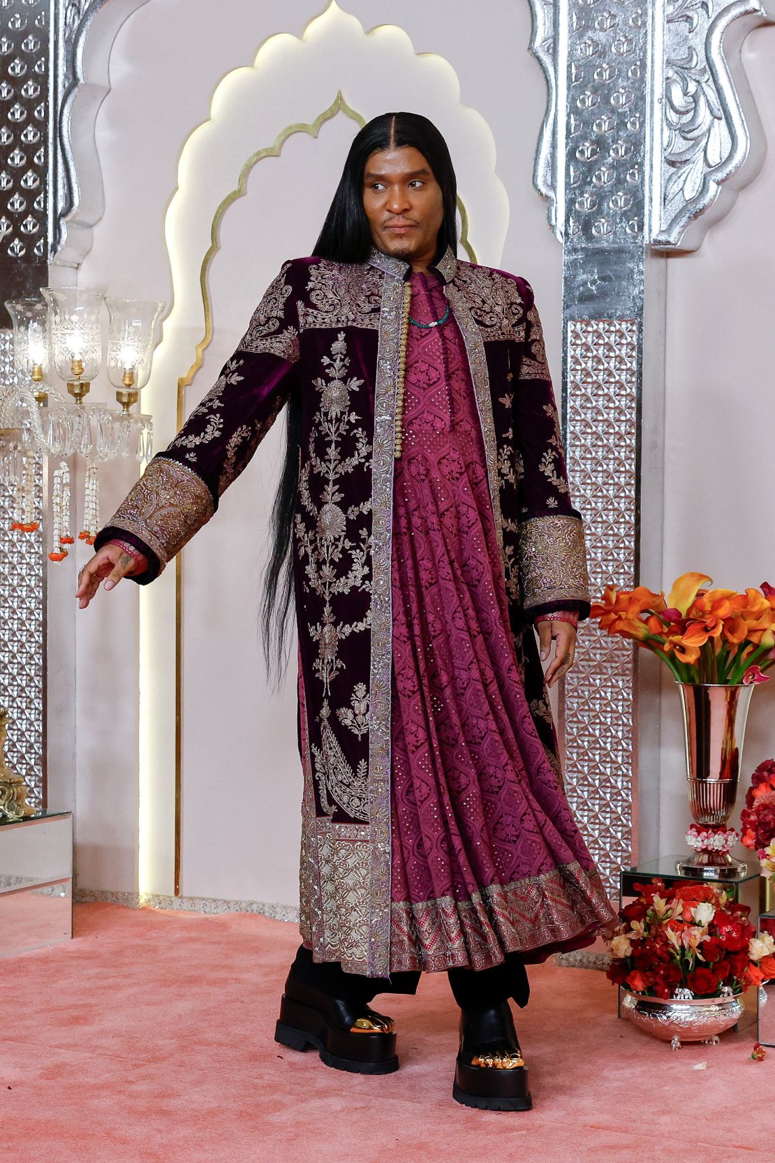 Stylist Law Roach paired his traditional Indian ensemble with a pair of Schiaparelli shoes.