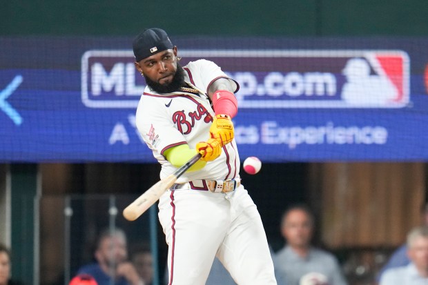 The Atlanta Braves’ Marcell Ozuna connects during the MLB baseball...