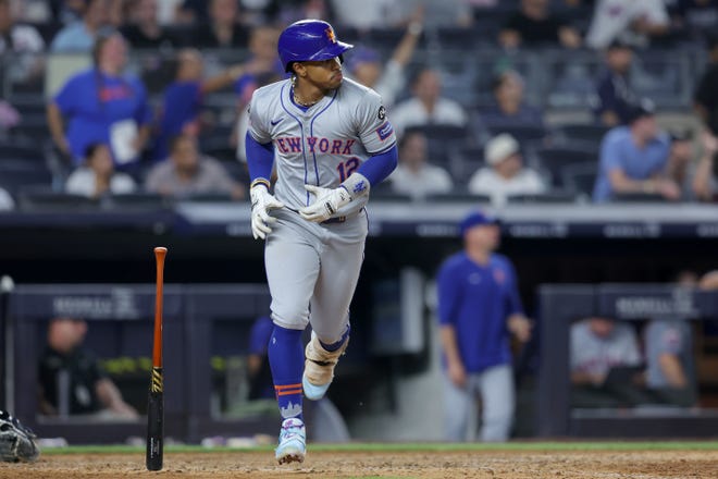 Jul 24, 2024; Bronx, New York, USA; New York Mets shortstop Francisco Lindor (12) watches his three run home run as he rounds the bases during the eighth inning against the New York Yankees at Yankee Stadium. Mandatory Credit: Brad Penner-USA TODAY Sports