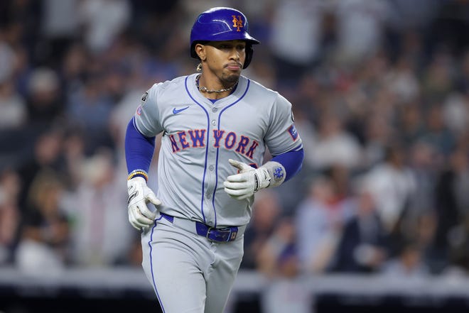 Jul 24, 2024; Bronx, New York, USA; New York Mets shortstop Francisco Lindor (12) rounds the bases after hitting a three run home run against the New York Yankees during the eighth inning at Yankee Stadium. Mandatory Credit: Brad Penner-USA TODAY Sports