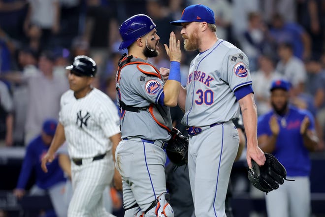 Jul 23, 2024; Bronx, New York, USA; New York Mets relief pitcher Jake Diekman (30) celebrates with catcher Luis Torrens (13) after defeating the New York Yankees at Yankee Stadium. Mandatory Credit: Brad Penner-USA TODAY Sports