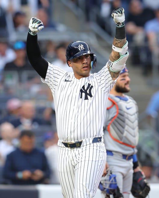Jul 23, 2024; Bronx, New York, USA; New York Yankees second baseman Gleyber Torres (25) celebrates his solo home run against the New York Mets during the second inning at Yankee Stadium. Mandatory Credit: Brad Penner-USA TODAY Sports