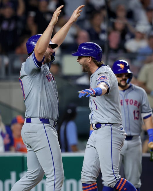 Jul 23, 2024; Bronx, New York, USA; New York Mets second baseman Jeff McNeil (1) celebrates his two run home run against the New York Yankees with first baseman Pete Alonso (20) during the sixth inning at Yankee Stadium. Mandatory Credit: Brad Penner-USA TODAY Sports