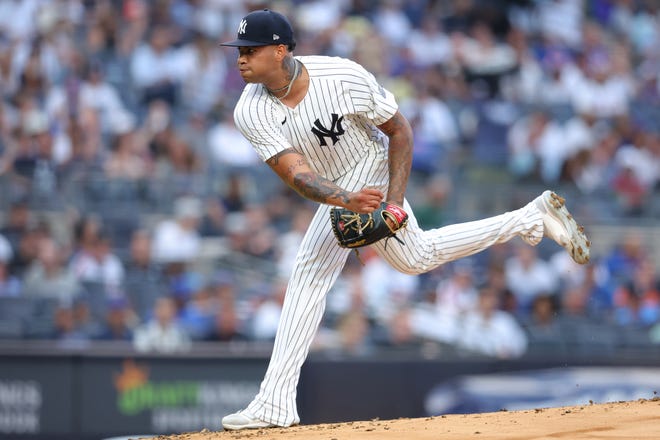 Jul 23, 2024; Bronx, New York, USA; New York Yankees starting pitcher Luis Gil (81) follows through on a pitch against the New York Mets during the first inning at Yankee Stadium. Mandatory Credit: Brad Penner-USA TODAY Sports