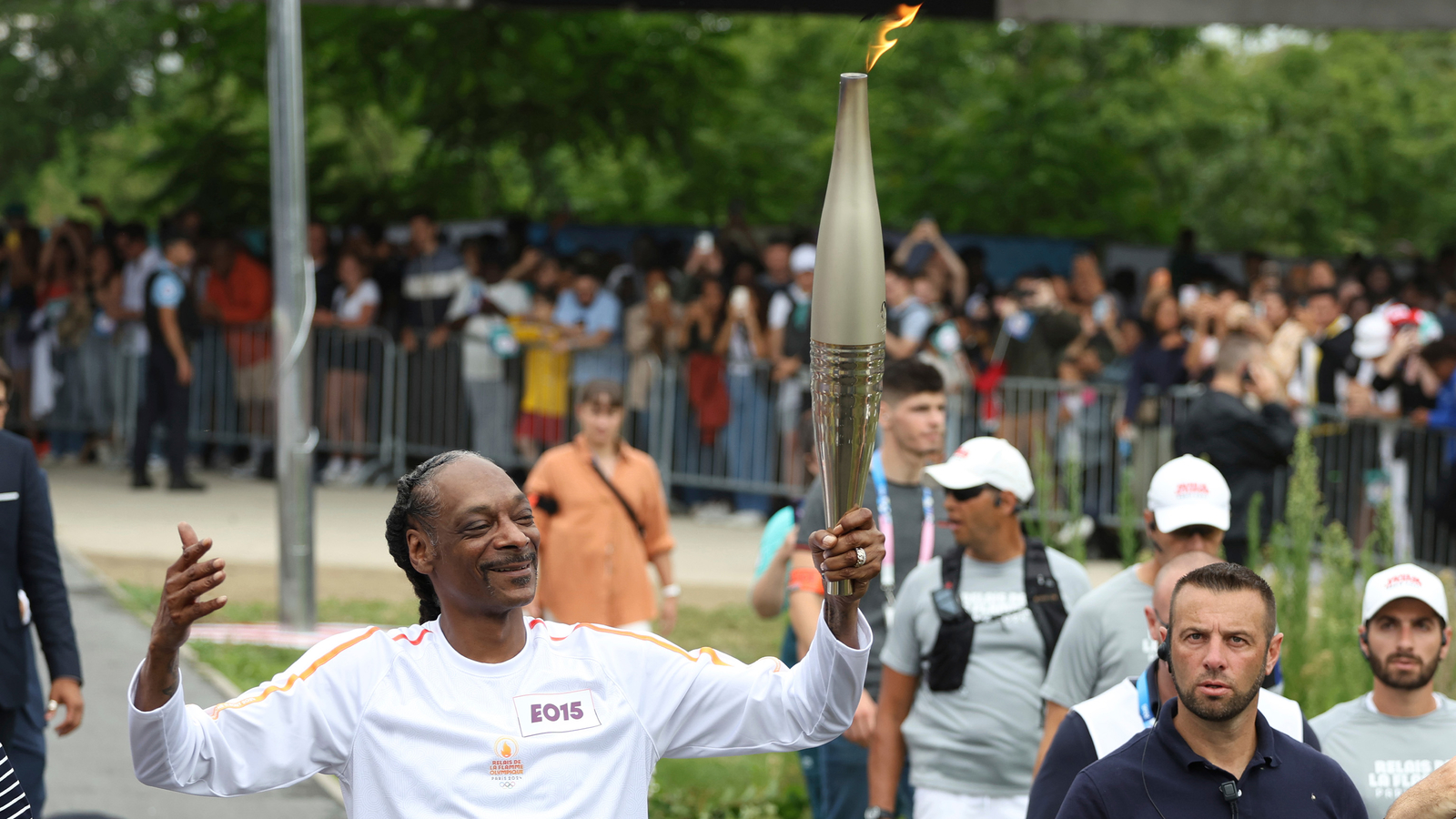 Why is Snoop Dogg at Olympics? Snoop Dogg carries the Olympic torch before opening ceremony in Paris