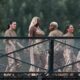 Aya Nakamura (C) and dancers perfom on the Pont des Arts footbridge during the opening ceremony of the Paris 2024 Olympic Games in Paris on July 26, 2024. (Photo by Gabriel BOUYS / AFP) (Photo by GABRIEL BOUYS/AFP via Getty Images)