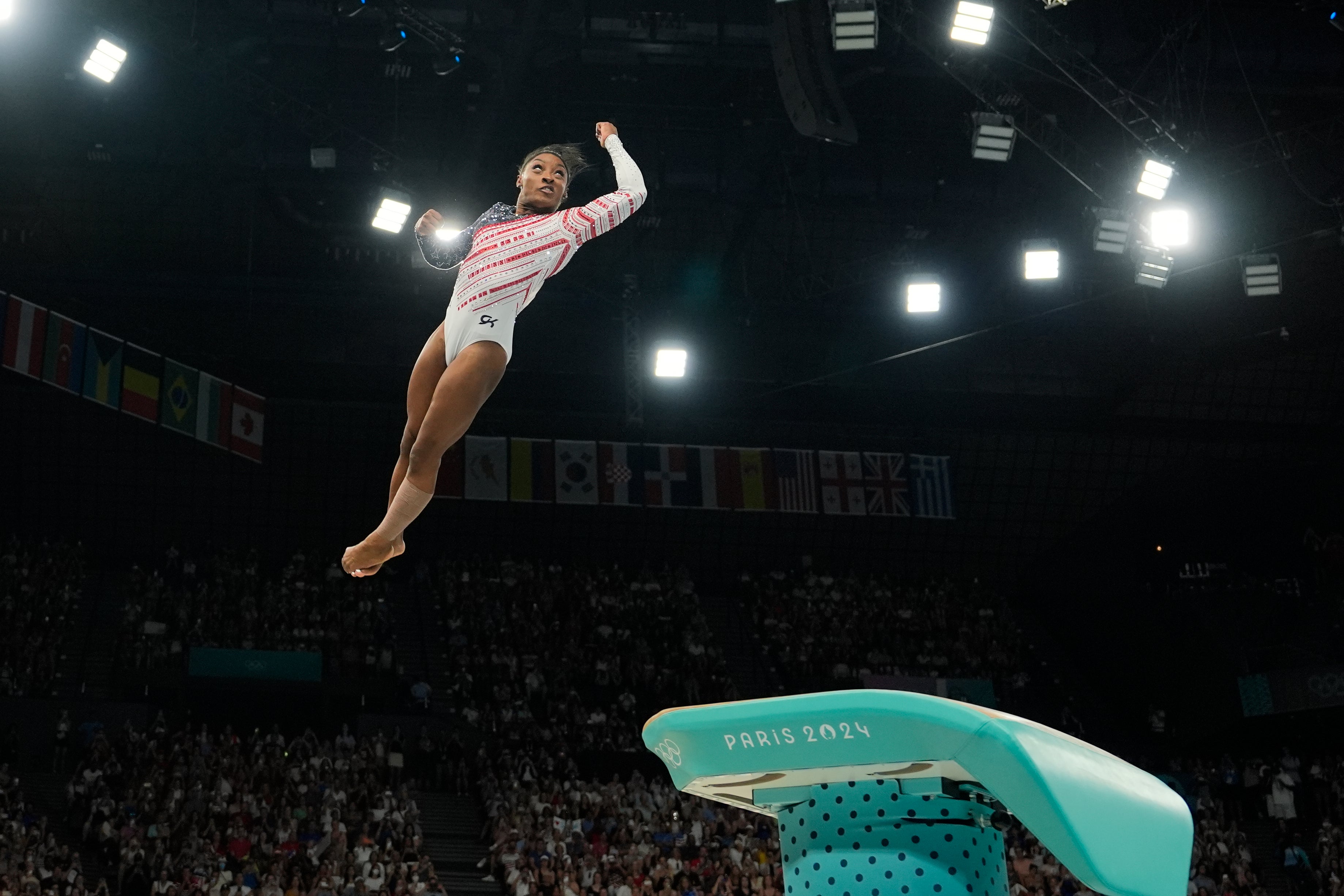 Biles performs on the vault en route to team gold