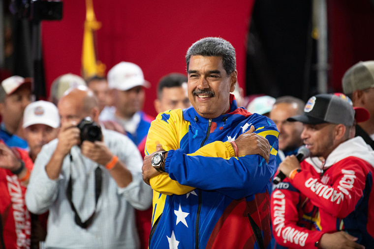 Venezuelan President Nicolas Maduro celebrates after winning the presidential election at Miraflores Palace July 28, 2024 in Caracas.