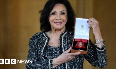 Dame Shirley Bassey receives top honour from King Charles