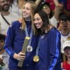 Team USA's men's swimming team stands on the podium after winning gold in the men's 400-meter freestyle relay final at the Paris Olympics on Saturday.