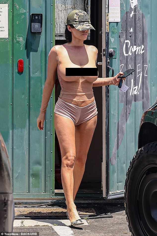 The Australian architect, 29, shocked onlookers as she fully exposed her breasts in a completely see-through netted top on her way to the Melrose Tanning Company salon yesterday