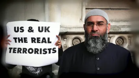 Anjem Choudary and a poster calling the UK 