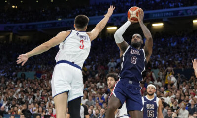 LeBron James, Kevin Durant lead U.S. men's basketball team past Serbia in opening Olympics game