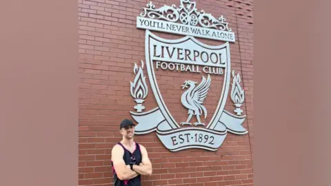 @_fc_challenge Fin outside Anfield Football Stadium