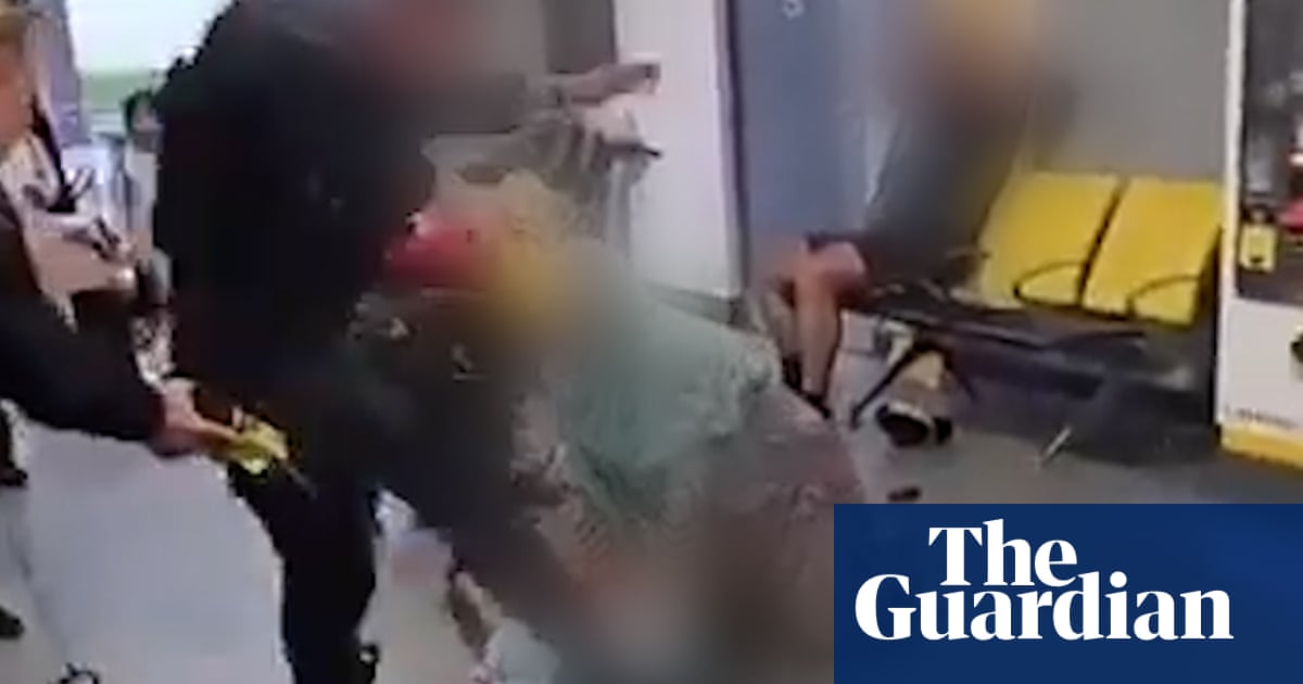 Racism played part in police kick incident at Manchester airport, says former senior officer | UK news