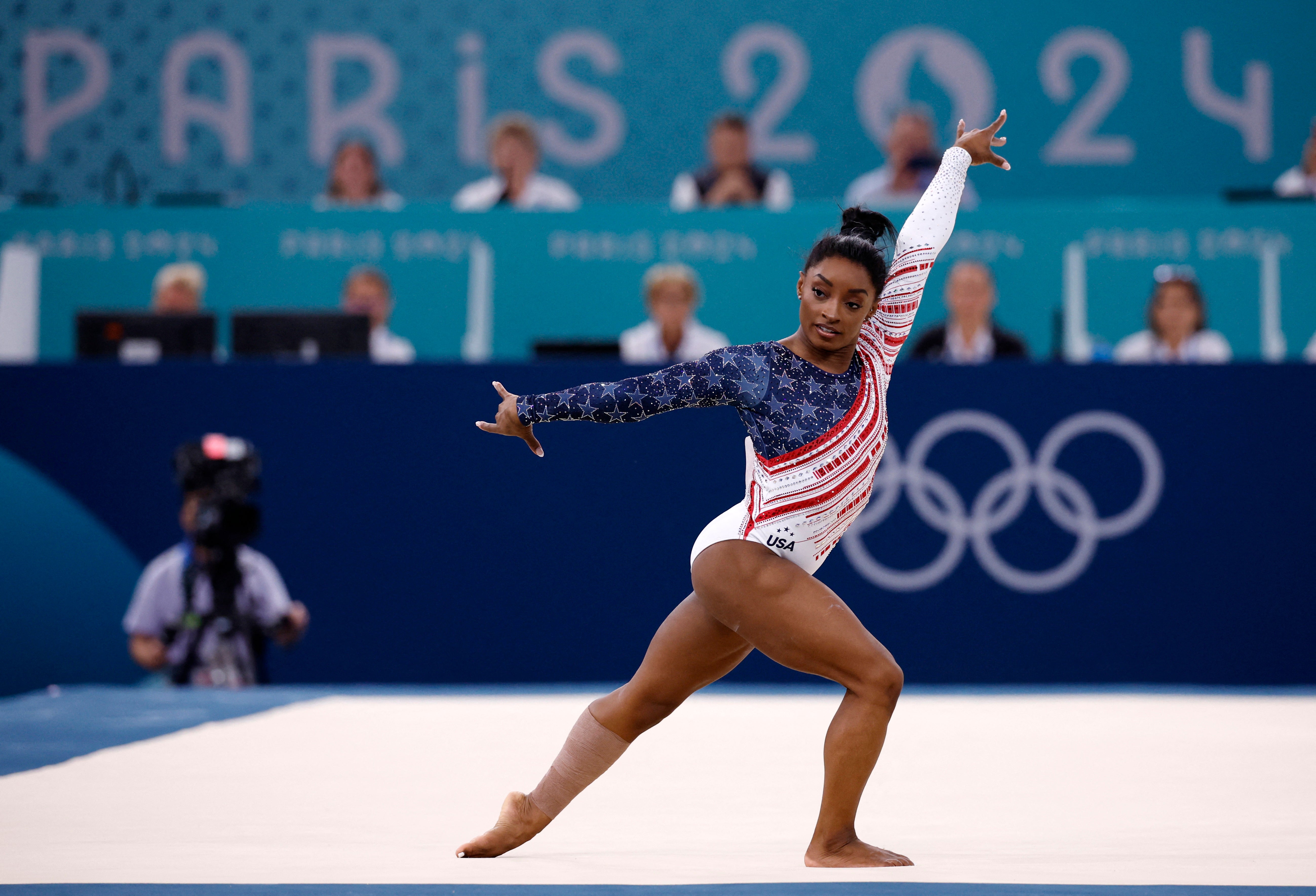 Biles performs her floor routine, the grand finale of the night