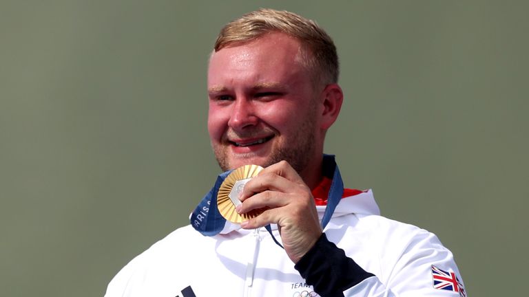 Nathan Hales celebrates with his gold medal