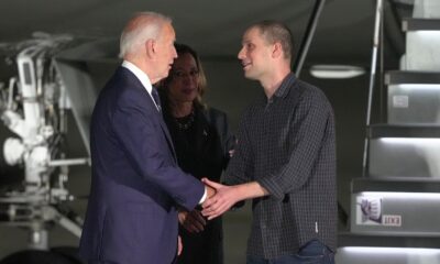 Evan Gershkovich, Paul Whelan greeted by President Biden, VP Harris after landing on US soil