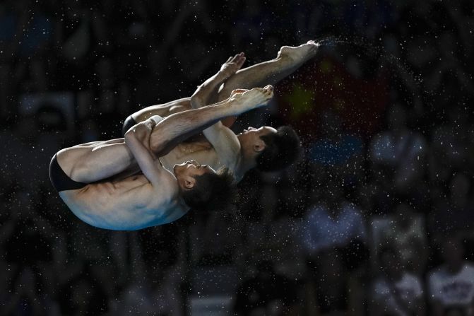 Chinese divers Lian Junjie and Yang Hao compete in the synchronized 10-meter platform event on July 29. The duo recorded the highest score in every round to win the gold medal.