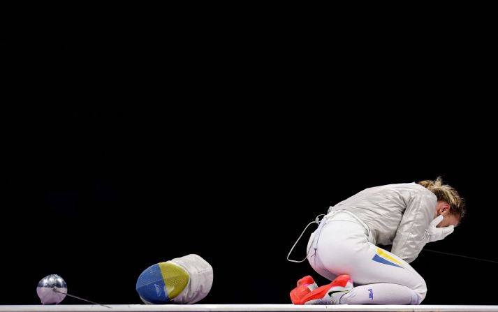 Hungarian fencer Krisztian Rabb, left, faces South Korea's Park Sang-won on July 31. South Korea won gold in the team sabre event.