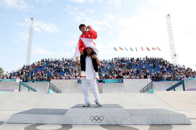 Japanese skateboarder Yuto Horigome celebrates with his gold medal after winning the street competition on July 29. Horigome also won the event at the Tokyo Olympics three years ago.