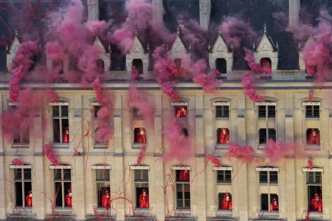 The opening ceremony depicted scenes from the French Revolution. Here, smoke billows near windows at the Conciergerie, the site where Marie Antoinette, the last French queen prior to the revolution, was imprisoned.