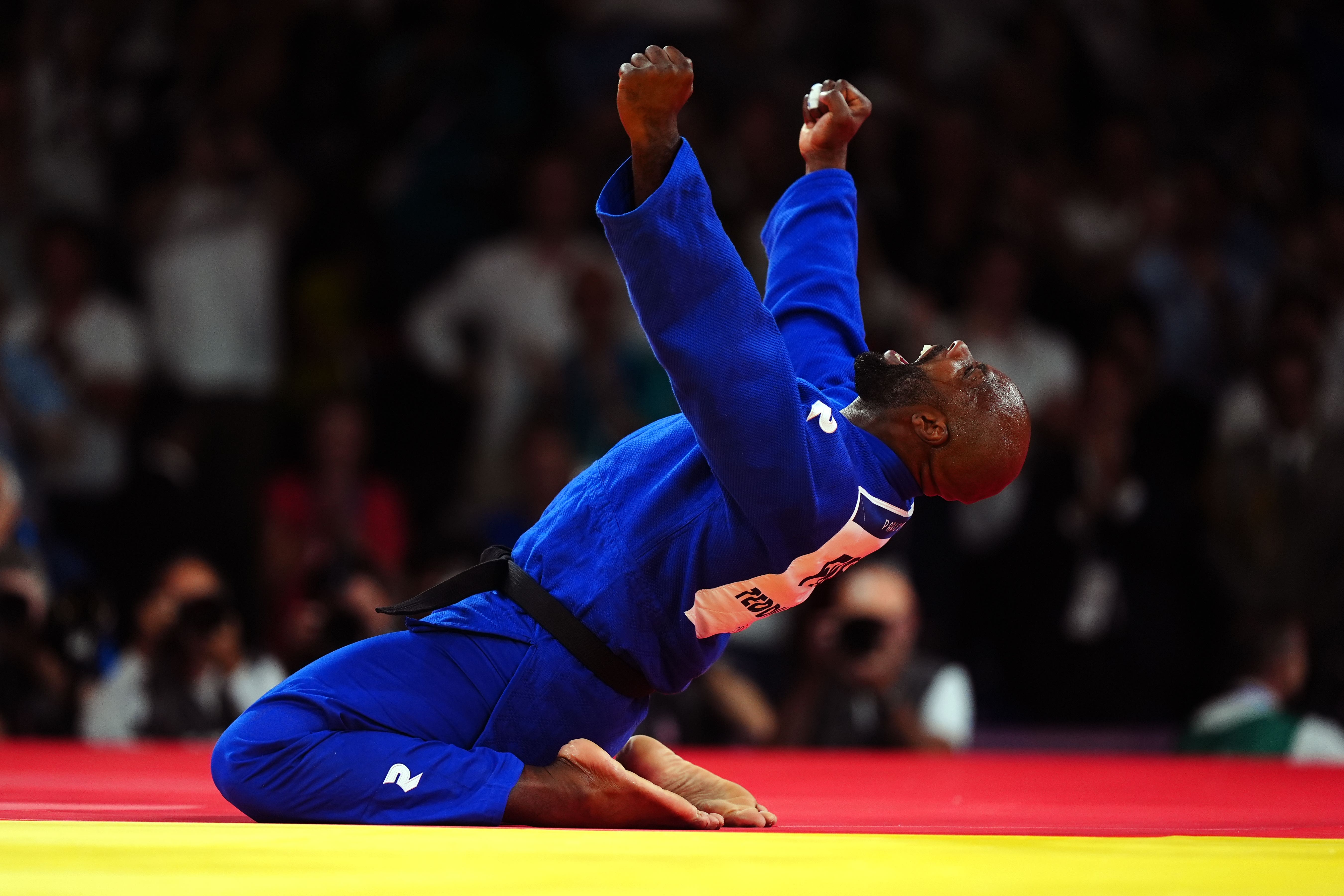 Teddy Riner celebrates victory over South Korea’s Kim Min-jong