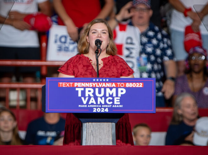 Cumberland County treasurer Kaytee Isley, sings “God Bless America” during a Donald Trump rally in the New Holland Arena at the Pennsylvania Farm Show complex in Harrisburg Wednesday, July 31, 2024.