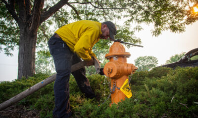 20+ structures burned; flames nearing homes