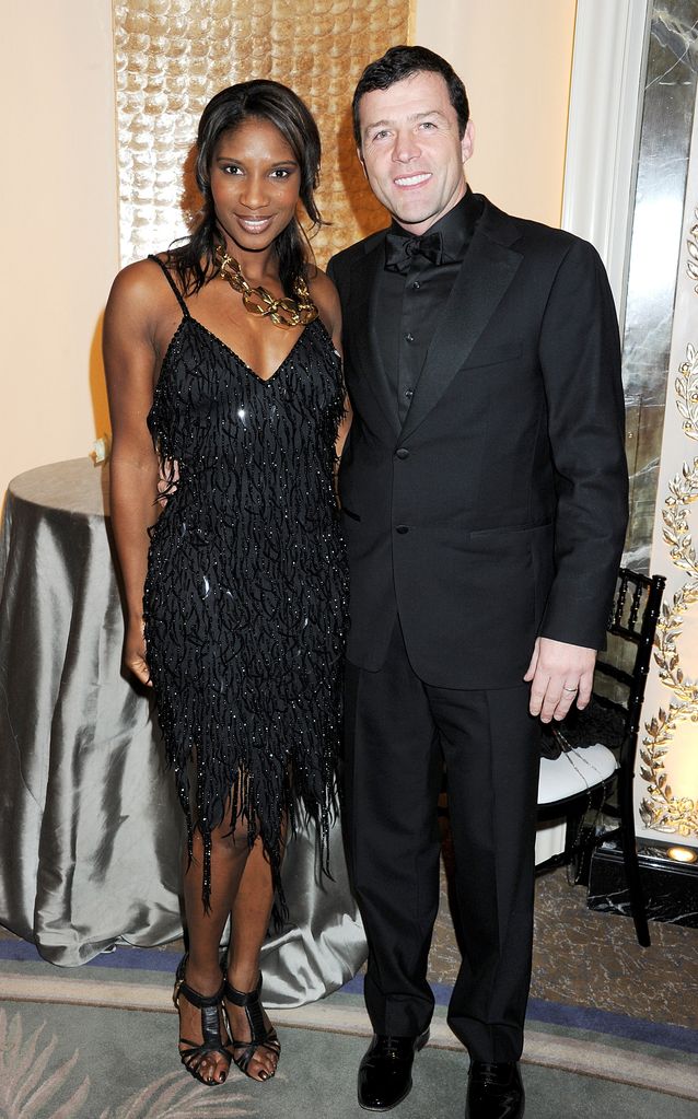 Denise Lewis in a black sparkly dress and Steve Finan O'Connor in a black suit