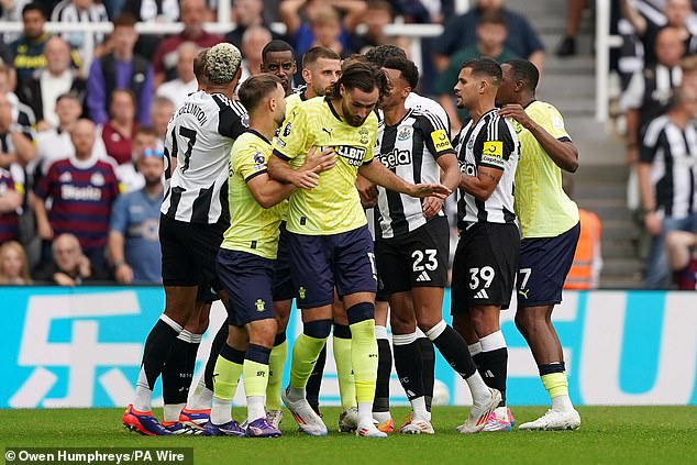 A scuffle then ensued as Newcastle players reacted angrily to the decision