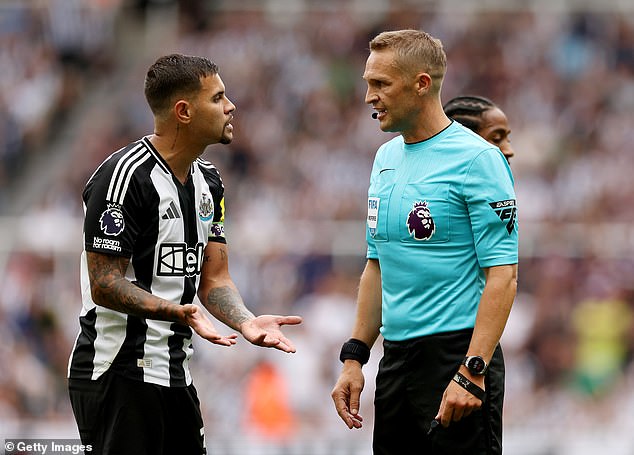 Magpies players, including Bruno Guimaraes (left), were left fuming after Craig Pawson (right) sent off their centre-back