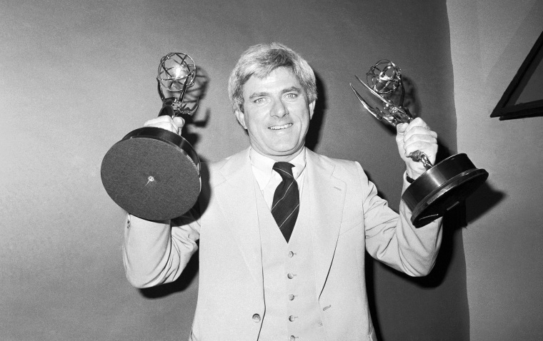 Phil Donahue holds Emmy he received as 