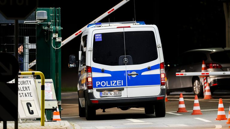 22 August 2024, North Rhine-Westphalia, Geilenkirchen: A police personnel carrier drives onto the military site Pic: AP 