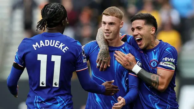 Madueke, Palmer and Enzo celebrating goal