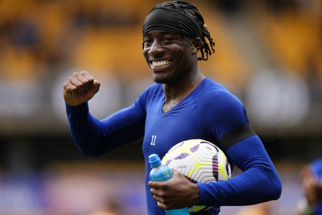 Noni Madueke celebrates his hat-trick against Wolves