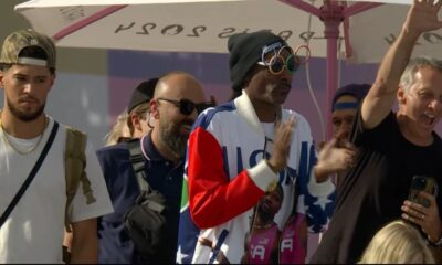 Screenshot of Devin Booker, Snoop Dogg and Tony Hawk watching the Paris Olympics park skateboarding...