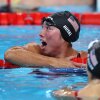 Torri Huske of Team USA reacts after winning gold in the women’s 100-meter butterfly final on Sunday at the Olympic Games in Paris.