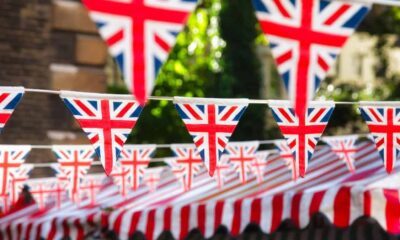 Union Jack flag triangular bunting hanging in a street